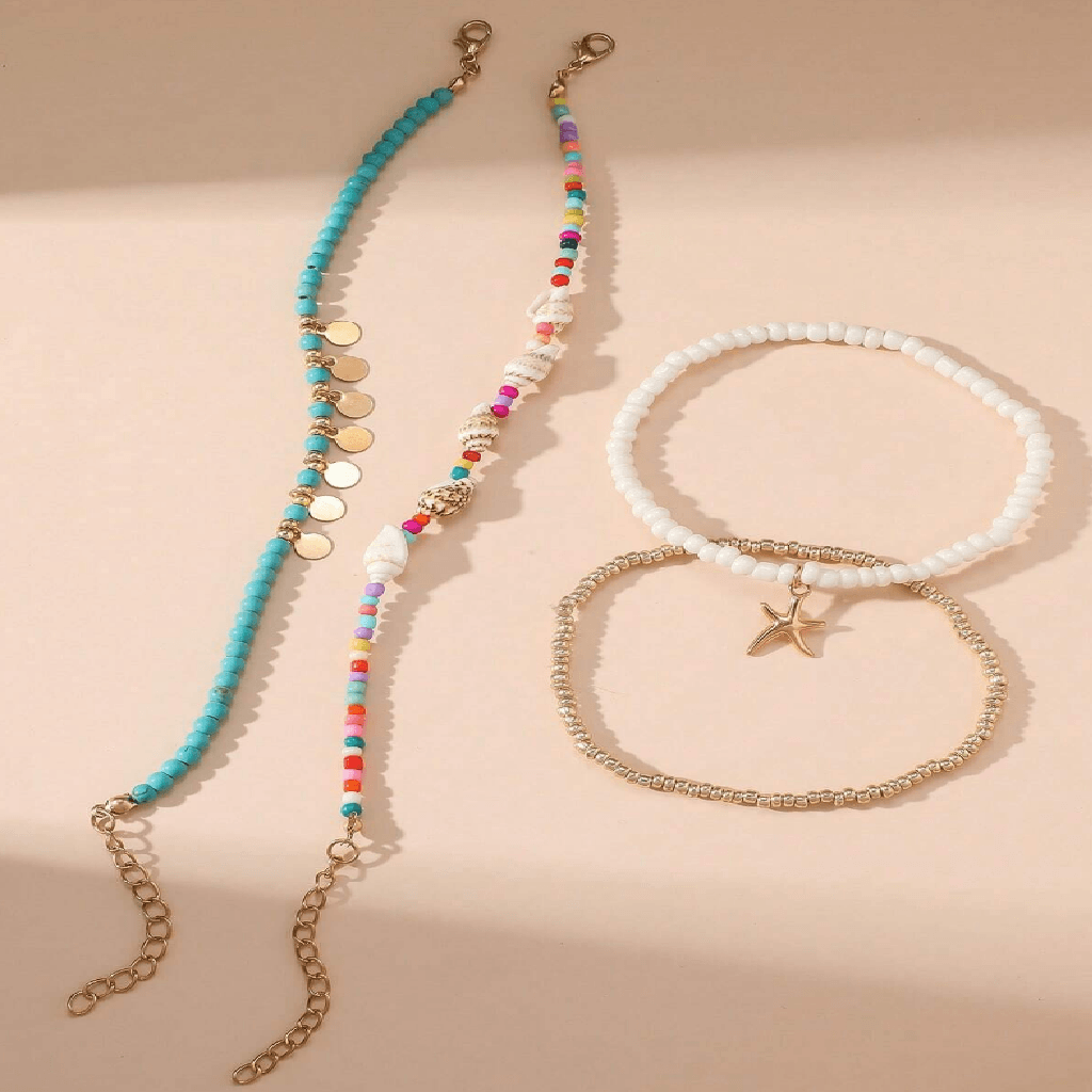 Four beaded bracelets with different color schemes on a beige background