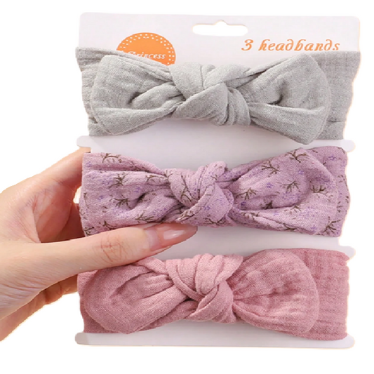 Set of three headbands in gray, pink, and purple