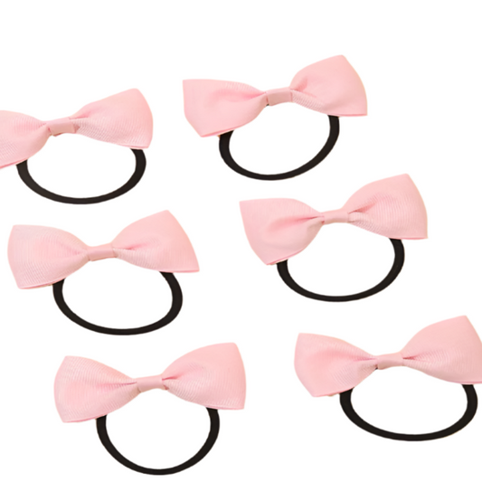 Pink hair bows with black elastic bands