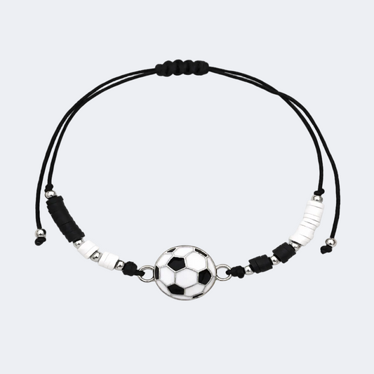 Bracelet with soccer ball charm on a light gray background