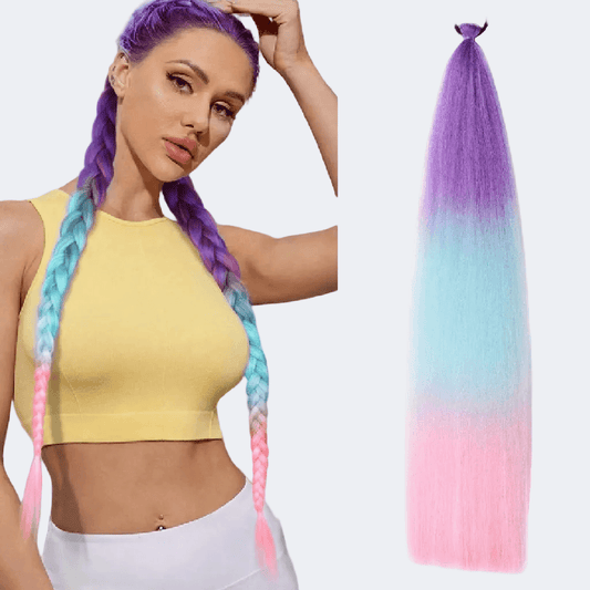 Woman with colorful braided hair extensions and a gradient hair extension on a white background