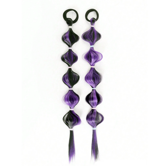 Purple and black hair extensions with clip ends on a white background