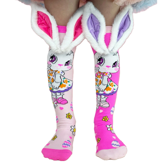 Pink knee-high socks with cartoon character design and bunny ears on a white background