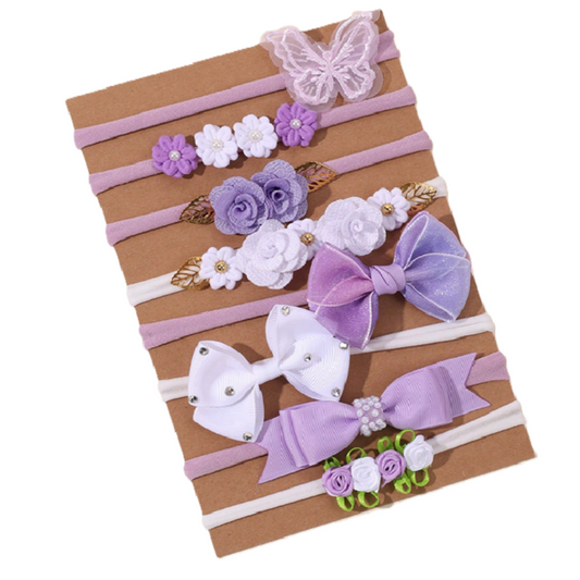 Set of decorative hairbands with flowers and bows
