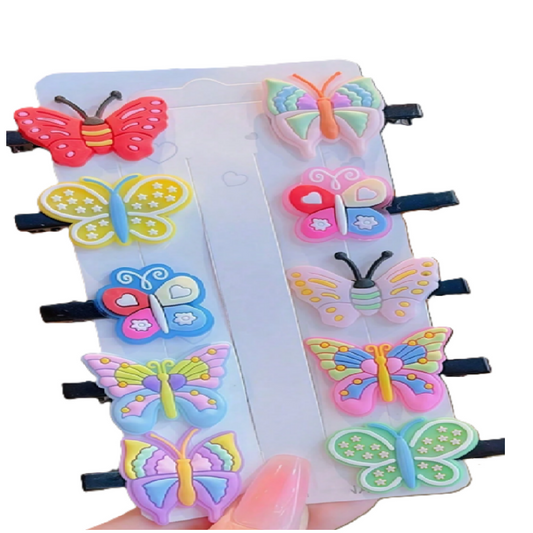 Colorful butterfly-shaped hair clips on a white background