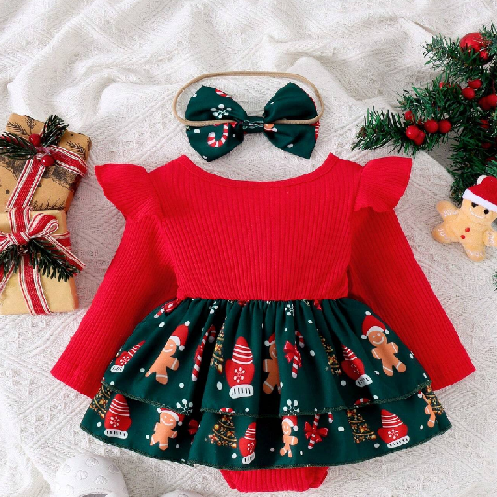 Red and green Christmas-themed outfit with a bow on a textured surface.