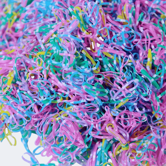Close-up of colorful rubber bands in various shades.