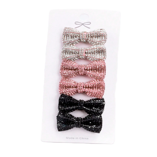 Set of three decorative bows in black, pink, and silver