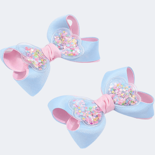 Light blue and pink hair bow with colorful confetti 
