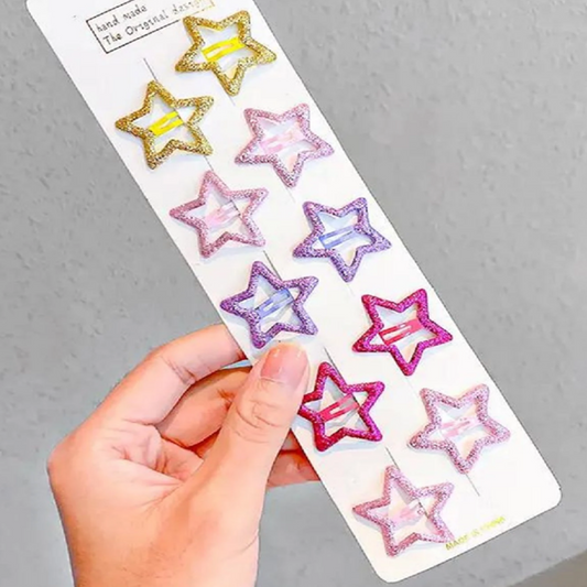 Star-shaped hair clips with glittery finish
