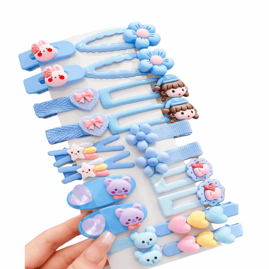 Set of colorful hair clips with animal designs on a white background