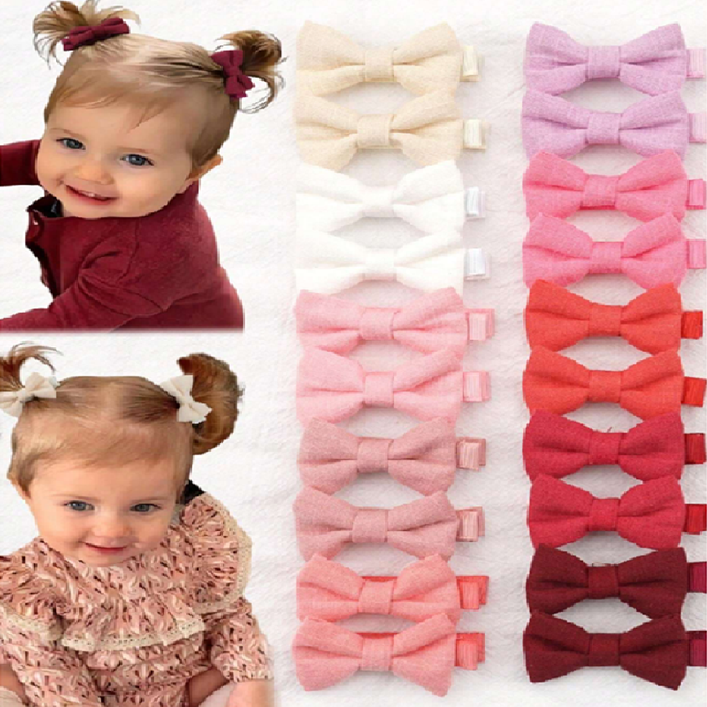 Two children with hair bows and a set of colorful bow hair accessories.