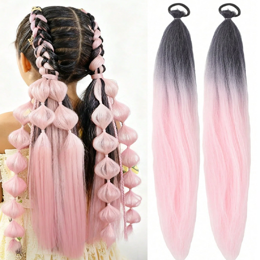 Pink and black ombre hair extensions with a braid on a white background