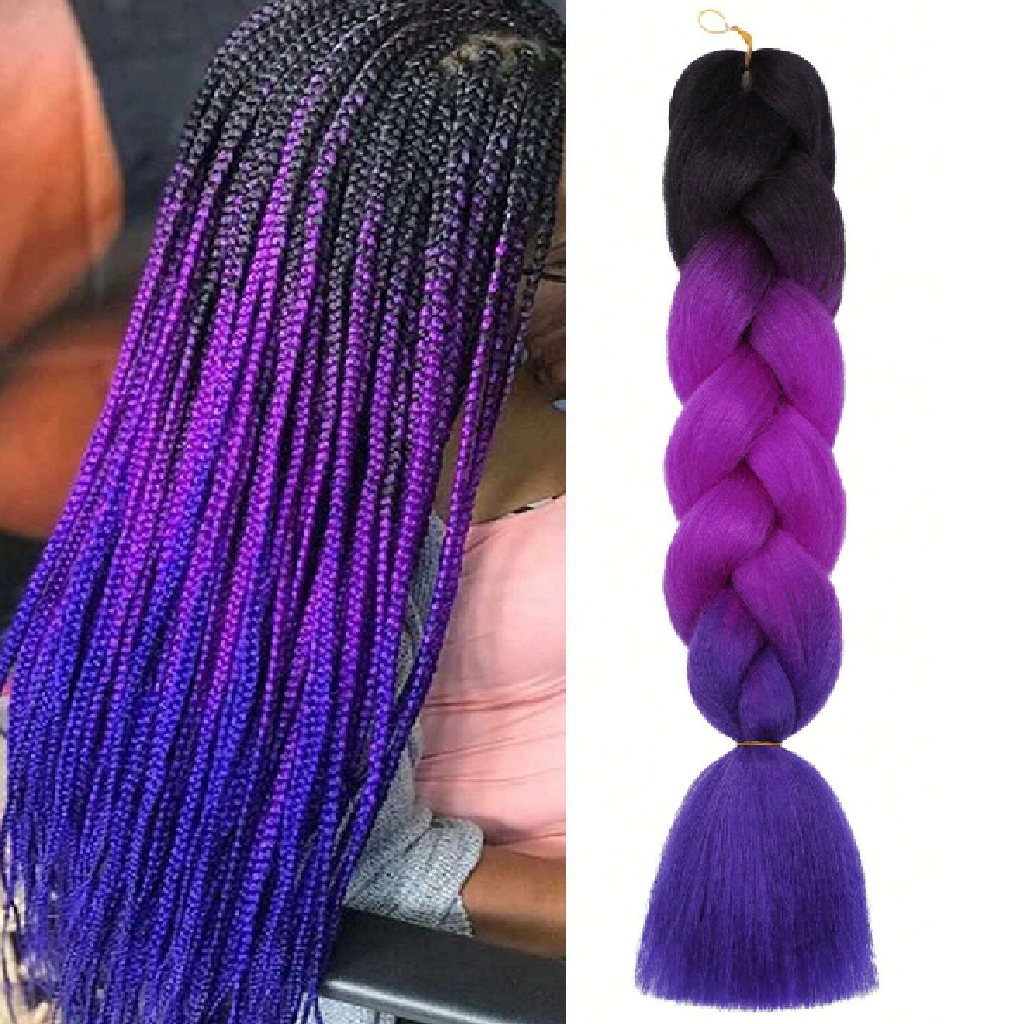 Purple and black braided hair extensions held by a person.