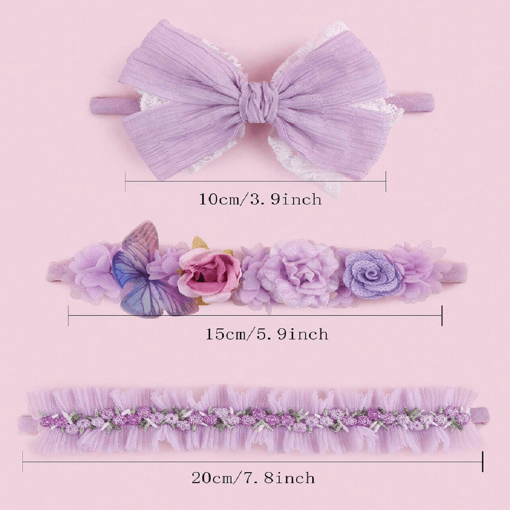 Set of three purple hair accessories with measurements on a pink background