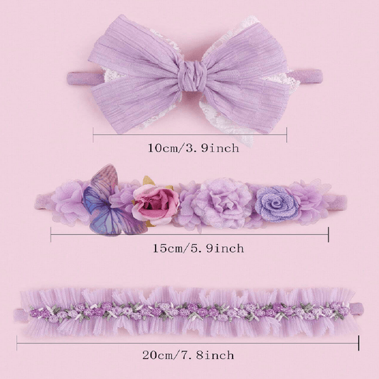 Set of three purple hair accessories with measurements on a pink background