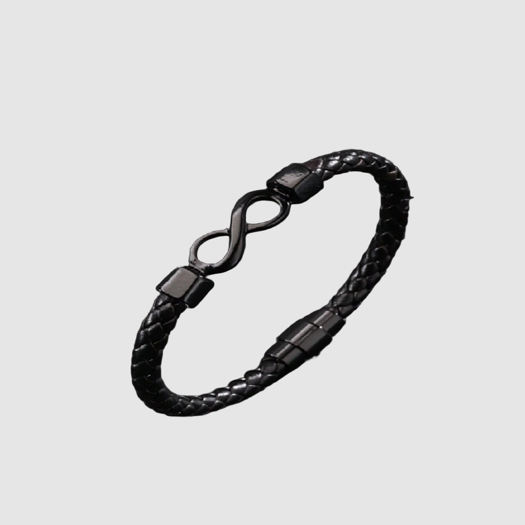 Black braided bracelet with an infinity symbol on a dark textured background