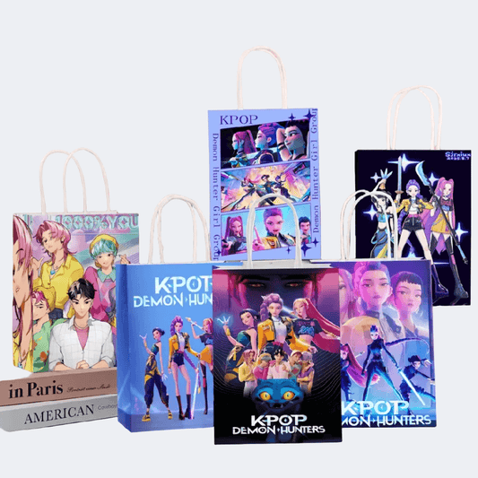 Set of KPOP-themed gift bags with character illustrations on a white background