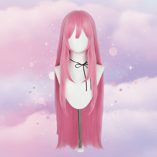 Pink wig on a mannequin against a pastel sky background