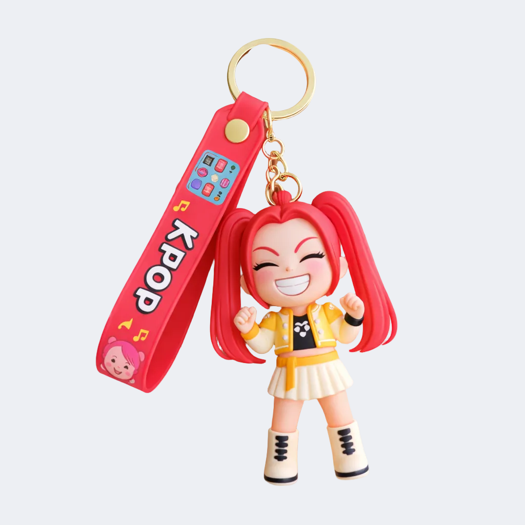 Keychain with a character and purple strap labeled 'KPOP' held by a hand on a white background