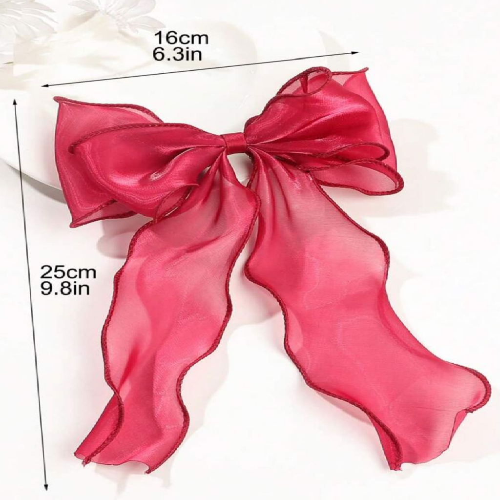 Red bow with measurements on a white background