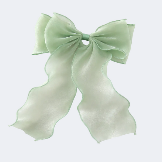 Light green bow on a white background