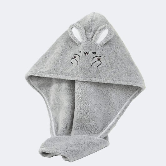 Gray hooded towel with bunny ears and face on a white background