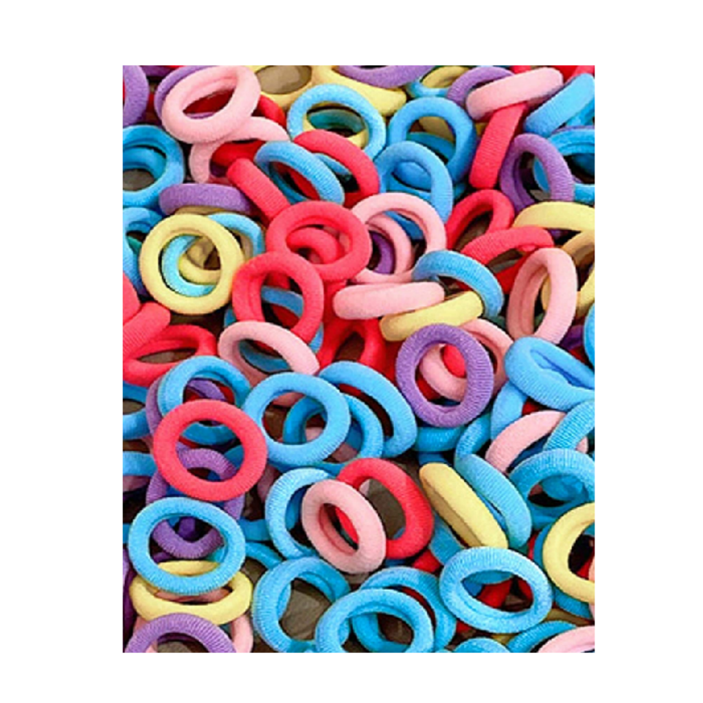 Assorted colorful rubber bands on a white background