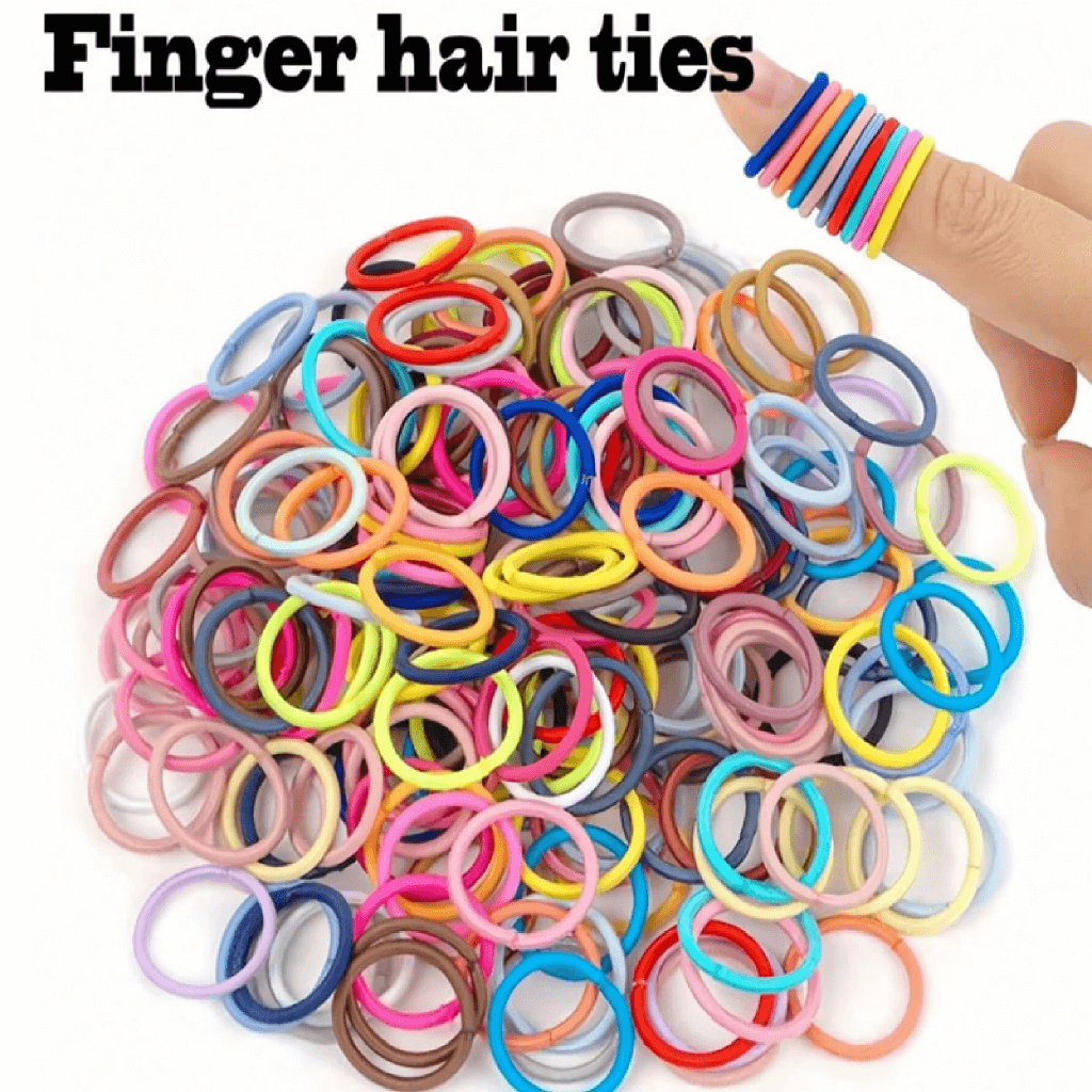 Colorful finger hair ties with a hand holding a few ties above a pile of them on a white background.
