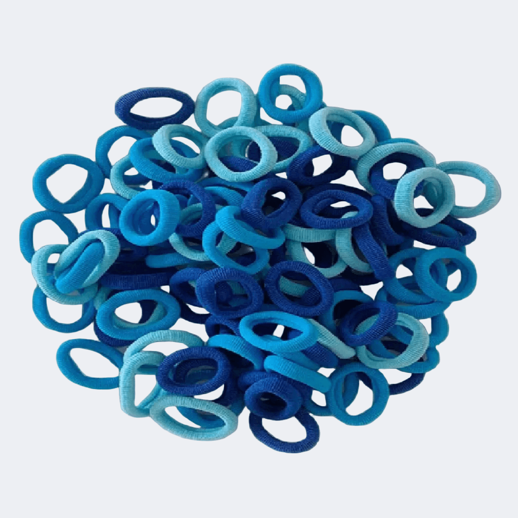 Blue hair ties in various shades on a white background