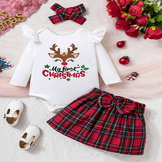 Christmas-themed baby outfit with reindeer design and plaid skirt on a light background