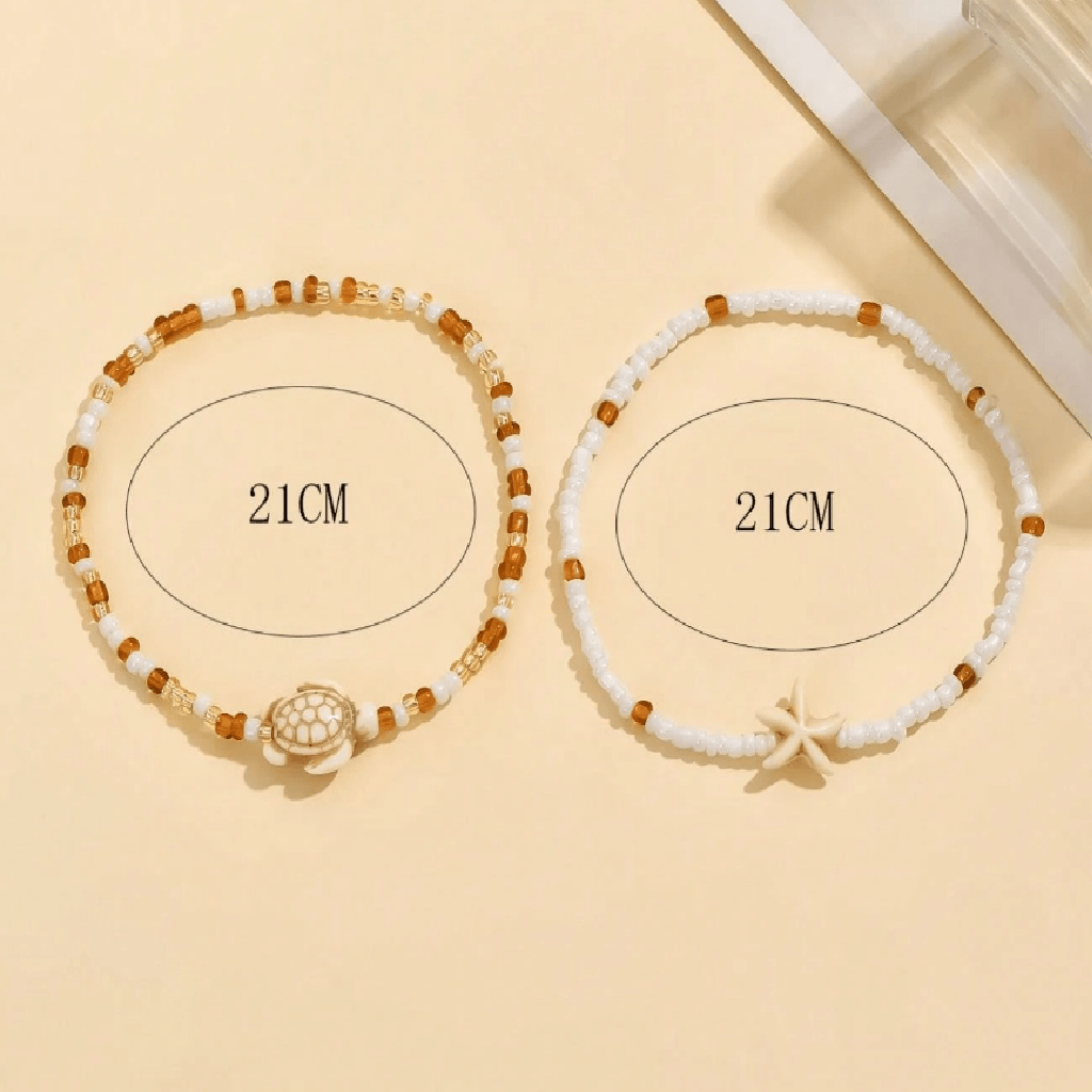 Two beaded bracelets with measurements on a beige background