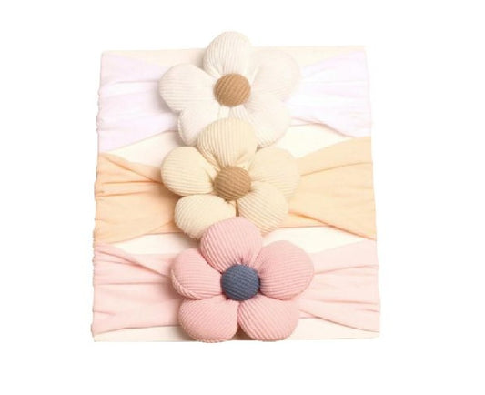 Pastel-colored flower-shaped headbands