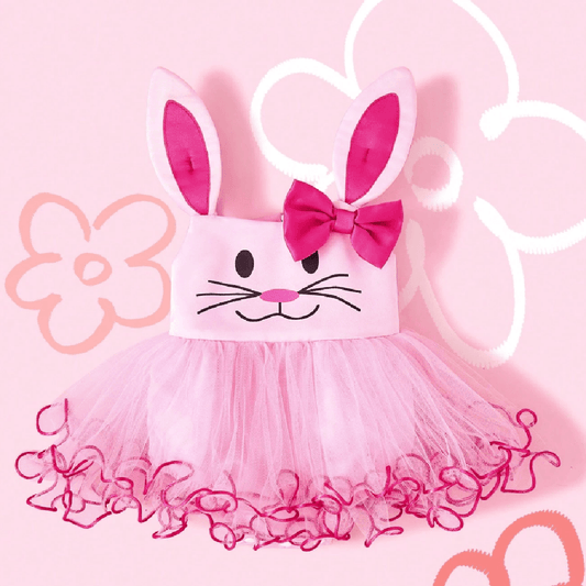 Pink bunny costume with ears and bow on a pink background
