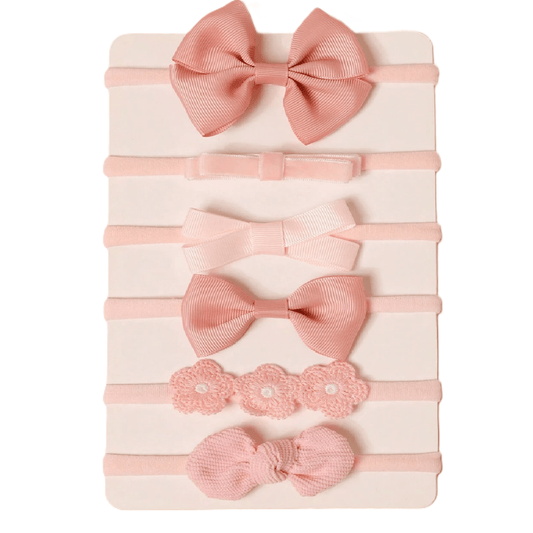Set of pink hair bows on a white background