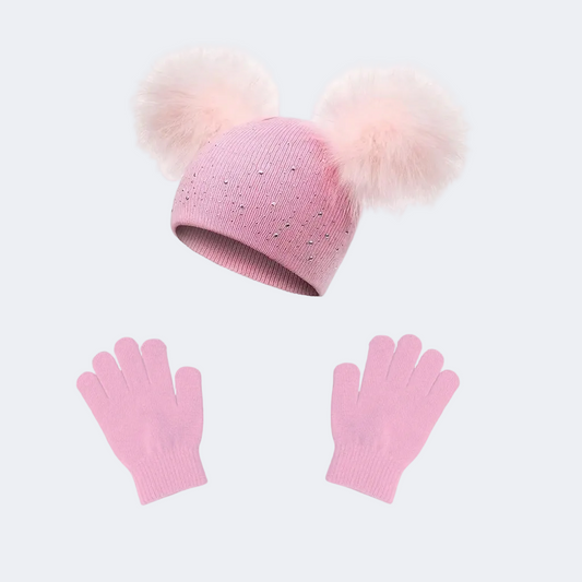 Pink beanie with pom-pom and matching gloves on a white background