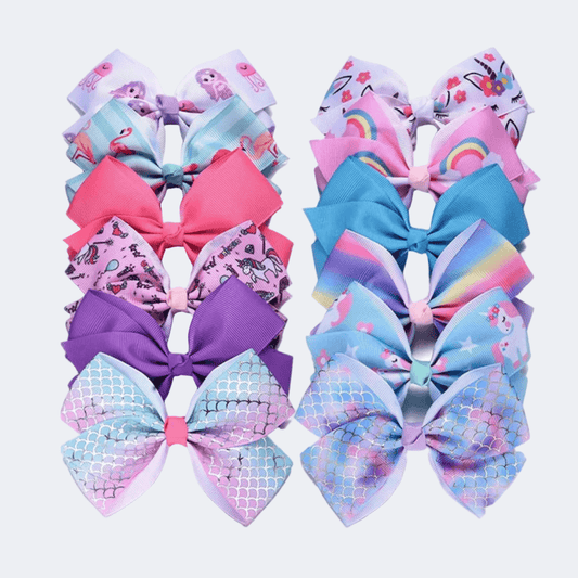 Set of colorful hair bows with various patterns on a white background