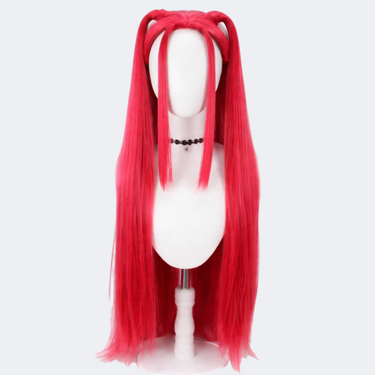 Red wig on a mannequin head against a white background