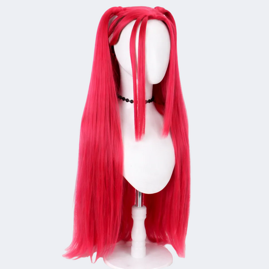 Red wig on a mannequin head against a white background