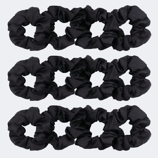 Black scrunchies arranged in a grid on a light gray background