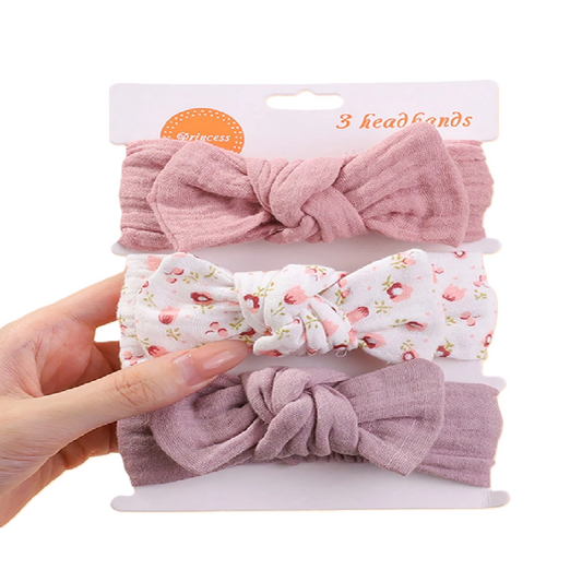 Set of three pink and floral-patterned headbands