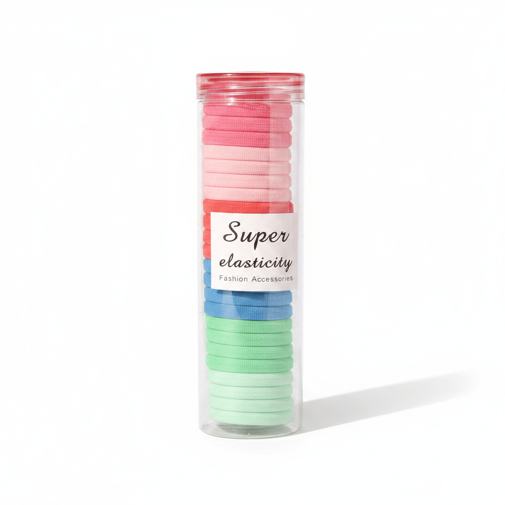 Tube of colorful hair ties with a label on a white background