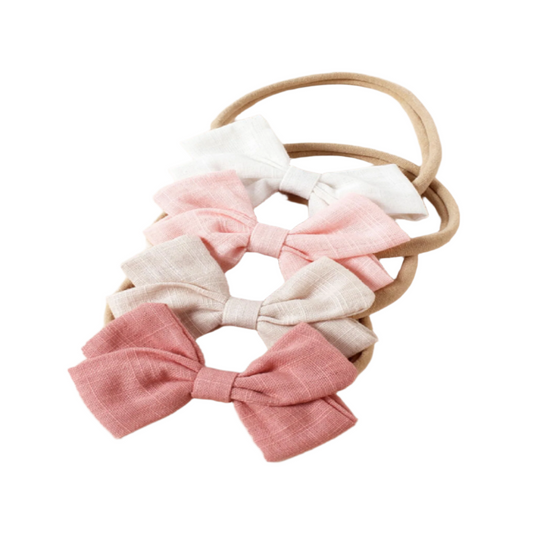 Set of pink and white hair bows