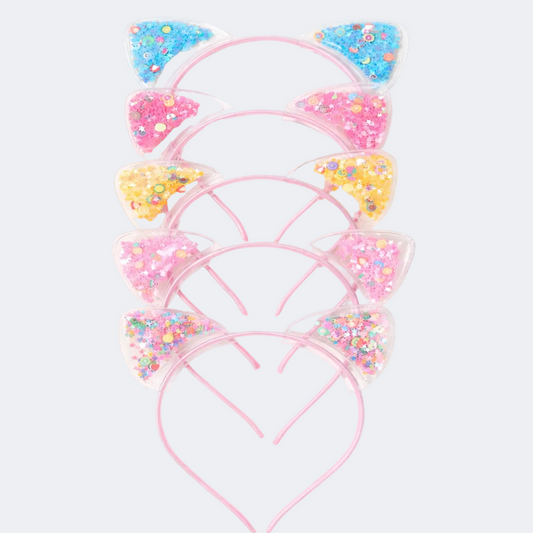 Set of colorful cat ear headbands on a white background