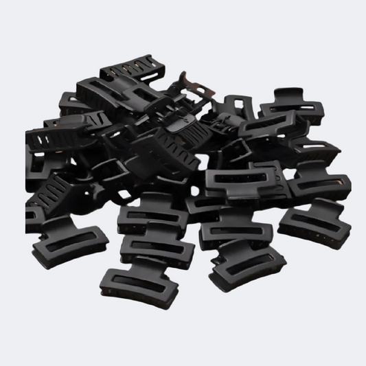 Pile of black plastic clips