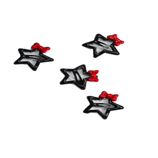 Four black star-shaped objects with red centers