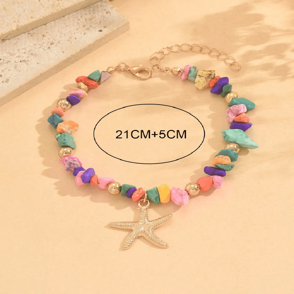 Colorful beaded bracelet with a starfish charm on a beige background