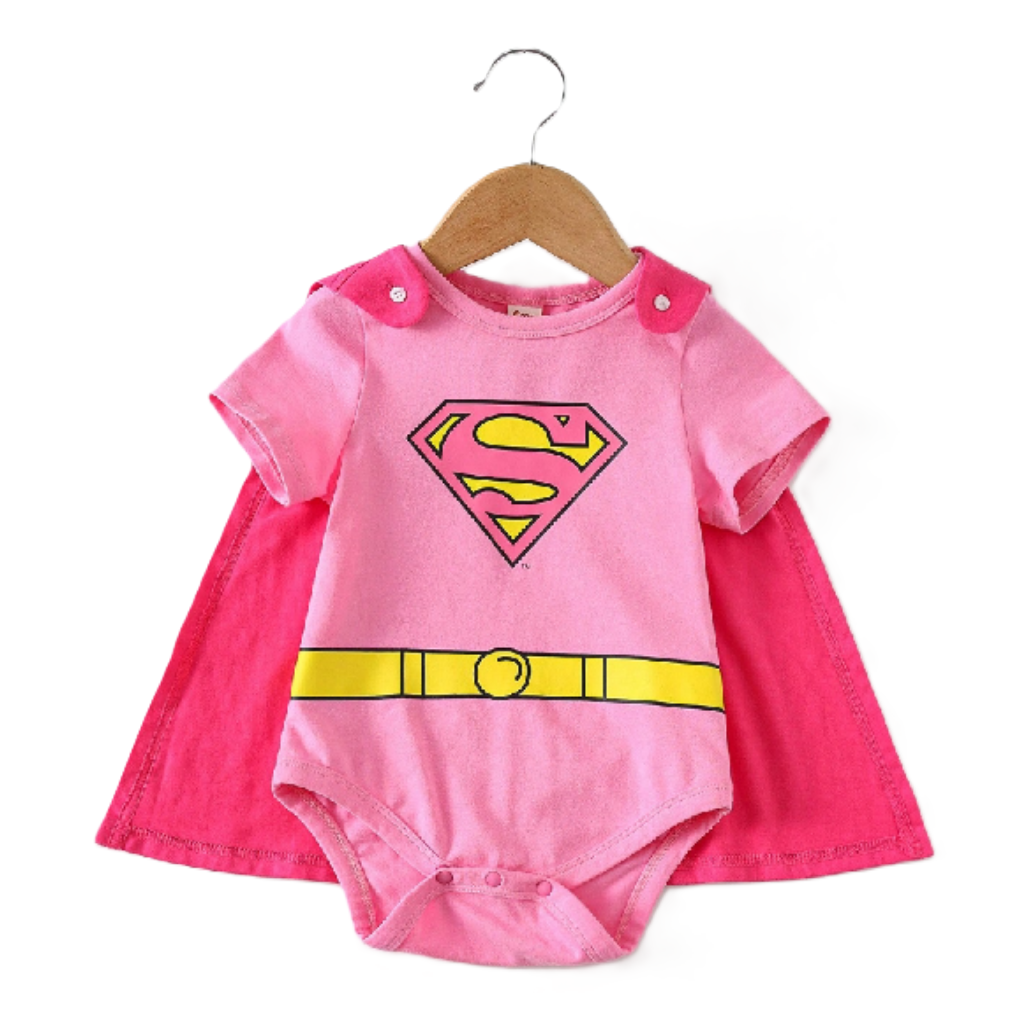 Pink superhero baby onesie with cape on a hanger against a white background