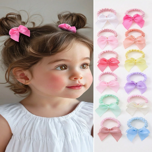 Child with pink hair bows