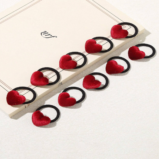 Red heart-shaped hair ties 